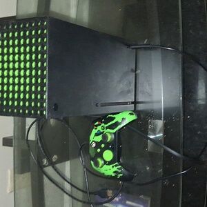 Series X Console with Green and Black Controller